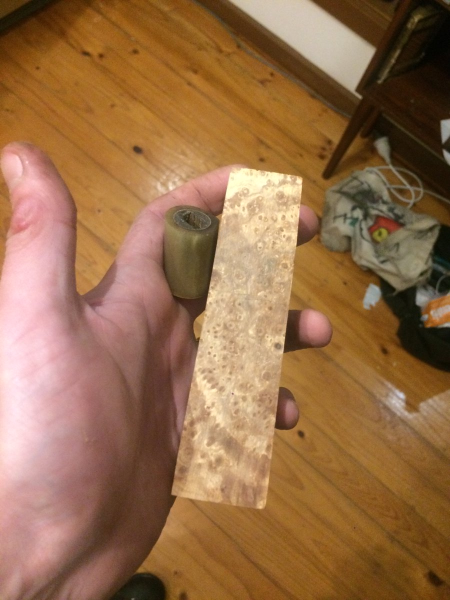 If we saw off the end of the original handle, glue the horn back on, and sand the excess wood off, then we're left with a ferrule that we can glue onto a nice bit of elm burl. And it will at as a guide for the shape of our new handle.