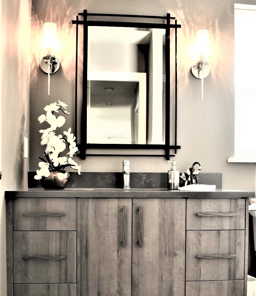Who else loves a moody bathroom design? 🙋🏼‍♀️

This half-bath features our Pacific Slab Qualicum Textured Thermofoil cabinetry. Comment one thing you love about this bathroom ⬇️

 #euroritecabinets