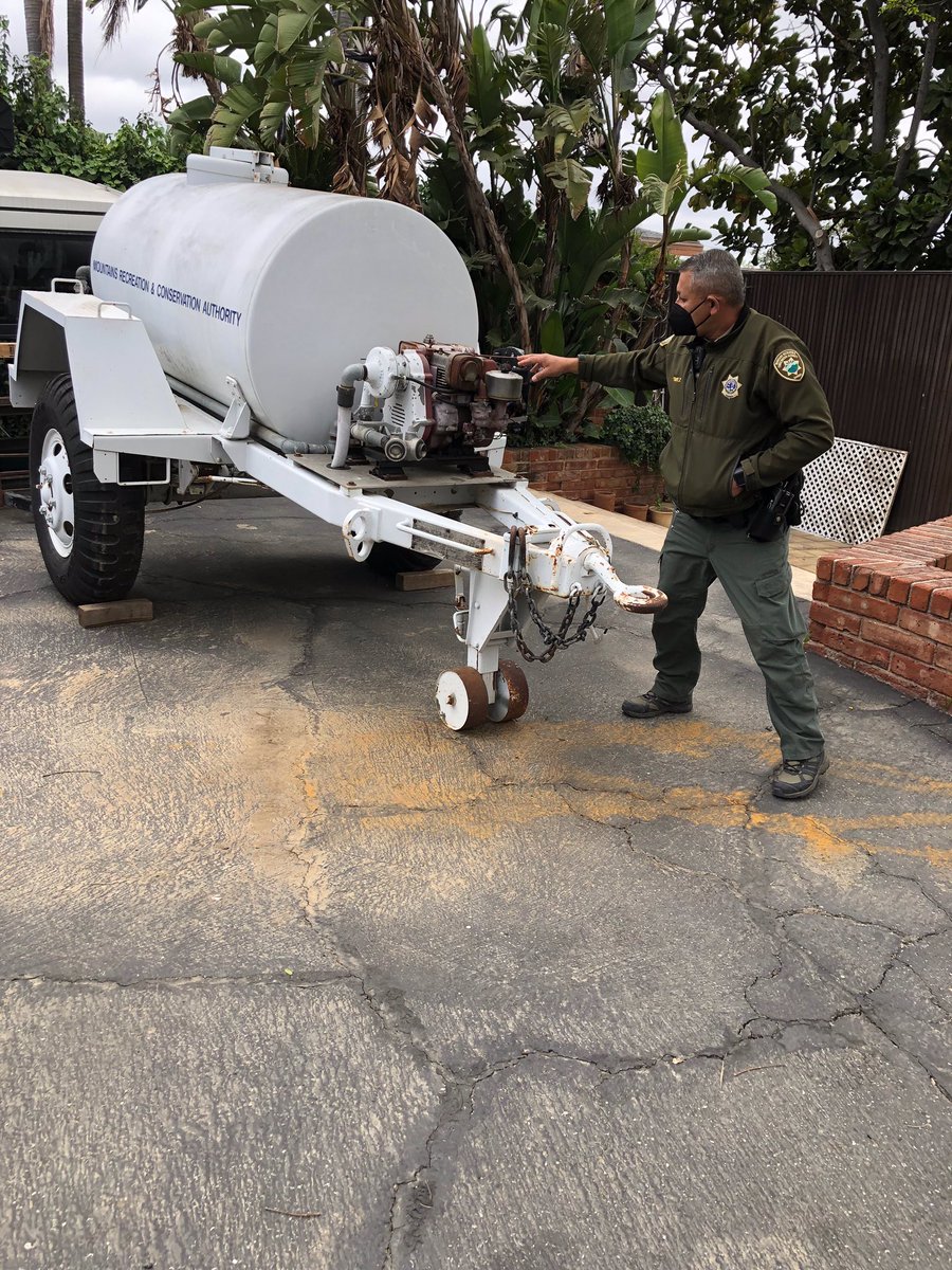PHHPA's tweet photo. Chief Ranger Gomez showing the 400 gallon water buffalo - extra water supply for fire season. This is in addition to the 100 gallon tank on all ranger trucks, helping keep the preserve & La Habra Heights safe. #powdercanyon #habitatauthority #mrcarangerdivision https://t.co/TWslVl86ZW