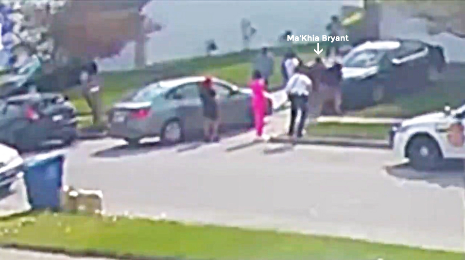 Here Ma’Khia Bryant approaches the first girl, and Nicholas Reardon is approximately 5 feet away. He can see she is holding a table knife, and he walks towards both girls with his right hand still on his firearm. Note where the girl in pink is standing...