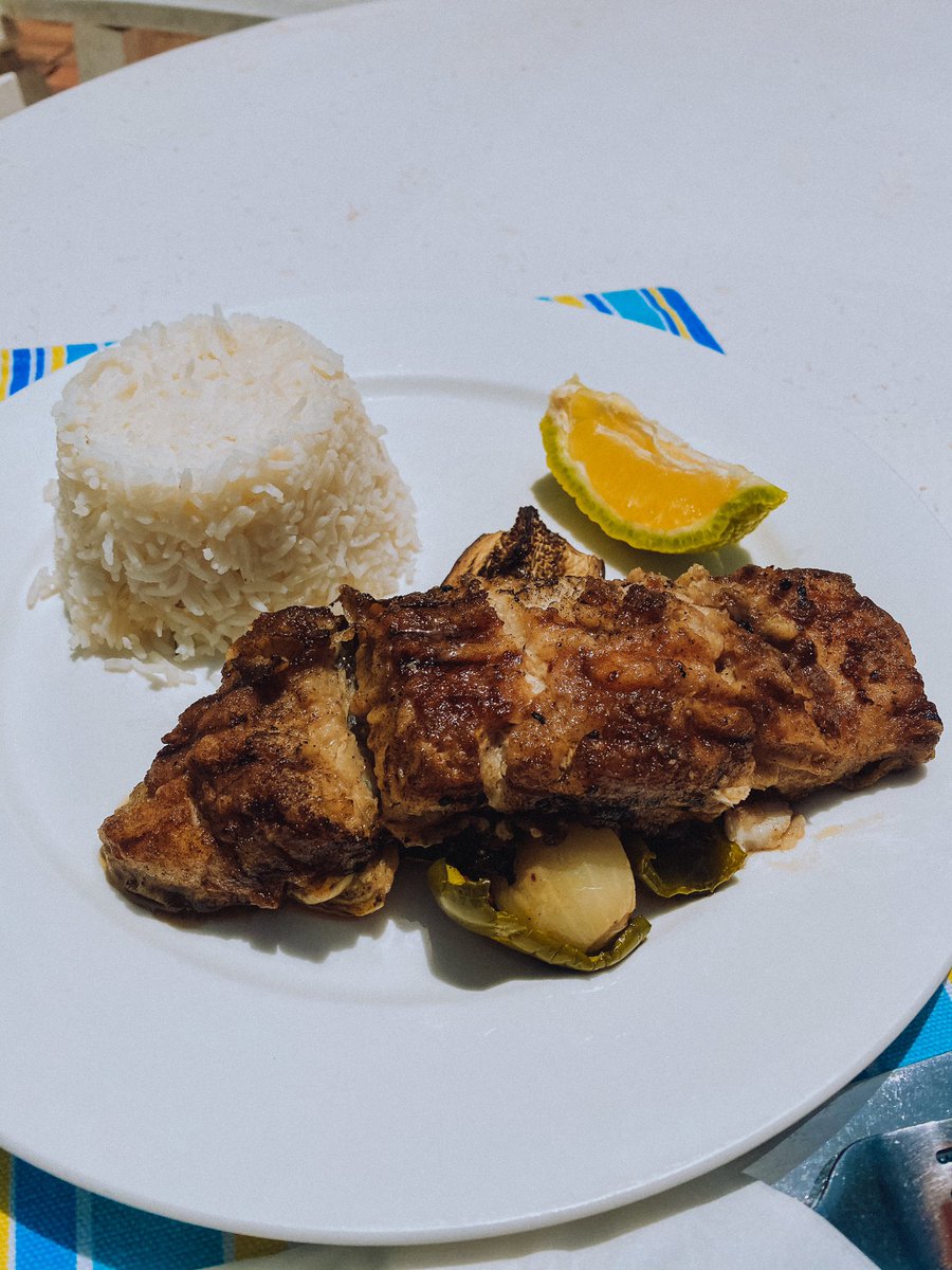 Lunch is served: Fish and rice. The Captain Jack fish was tasty.