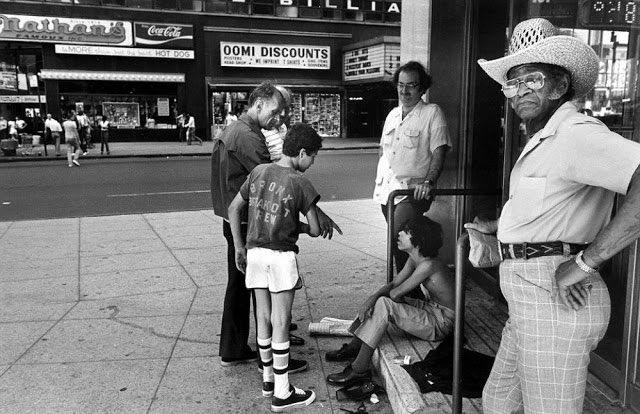 Times Square, Manhattan (1970s). The children of Times Square, many of whom engaged in underage prostitution. Photographed by Stephen Shames.