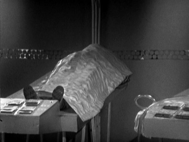 8/ An example of one of the bedrooms in the Colony - very comfy... The shiny circular patterned strips around the walls were also featured in the previous story, The Moonbase, on the walls of the sick bay.
