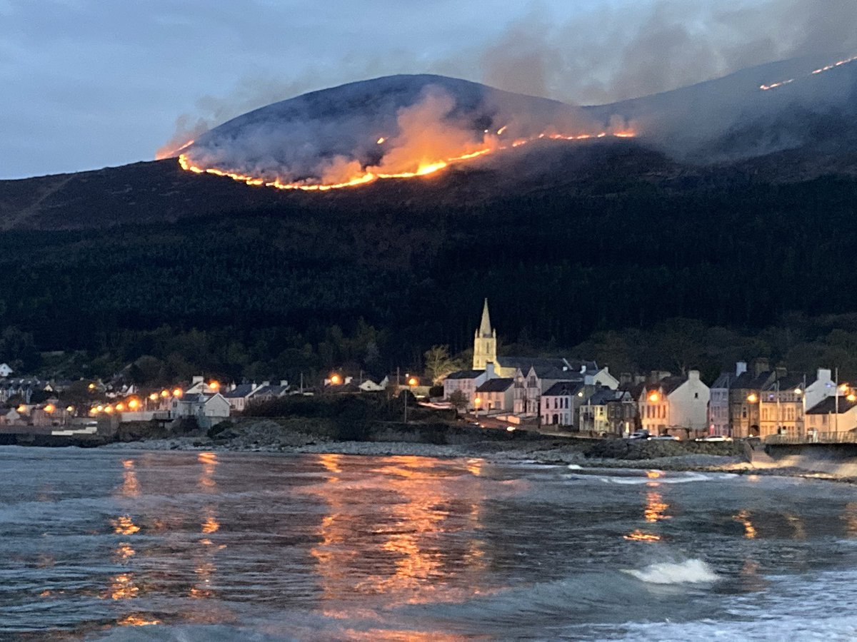 Mournes fire from Newcastle this evening.