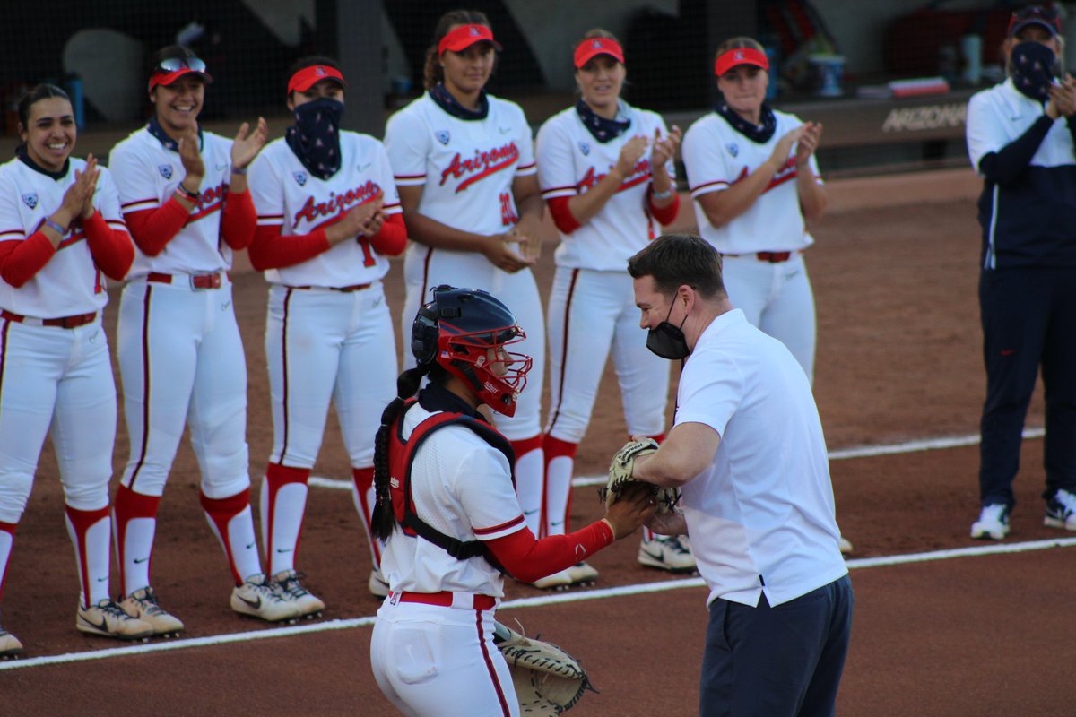 .@APlayersProgram coach Tommy Lloyd throwing out the first pitch for @ArizonaSoftball.