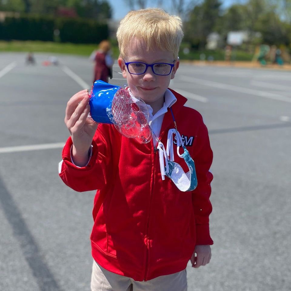 stmschoolatown's tweet image. #STMlearning Our 1st Graders learned about recycling and reusing objects to make something else. We took empty water bottles, mesh from fruit/vegetable bags, and duct tape to make bubble wands. We put it to the test. It worked! The kids had so much fun! #STMexcellence 🖤❤️🆒♻️