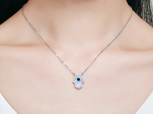 Excited to share the latest addition to my #etsy shop: Genuine 925 Sterling Silver and Opal Hamsa Hand of Fatima Necklace etsy.me/3tPVsPr #opal #unisexadults #silver #blueopal #whiteopal #motherofpearl #necklace #pendant #evileye