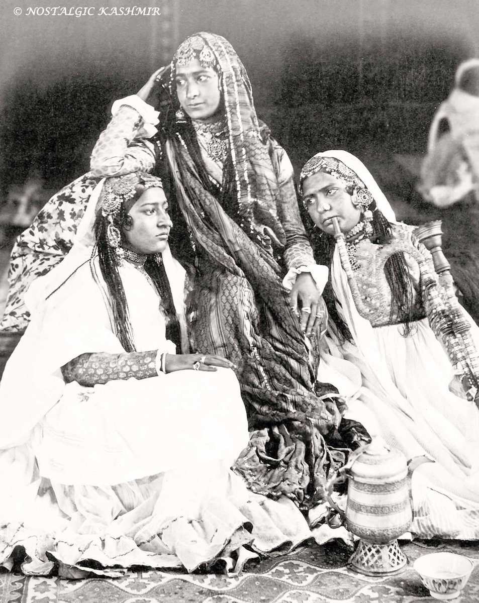 Photograph taken by John Burke & William Baker in 1869 showing Hafizas resting after a performance. (P3)