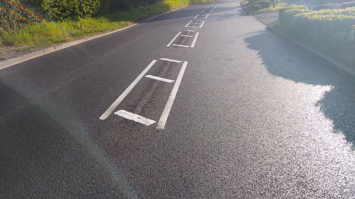 Today, I happened to see a freshly resurfaced Shepherds Hill & while this has nothing to do with cycling, it does show, in fact, that when a centre line is incorrectly installed it's apparently fine to burn it off and replace with hatching (which I have no view on for this site).
