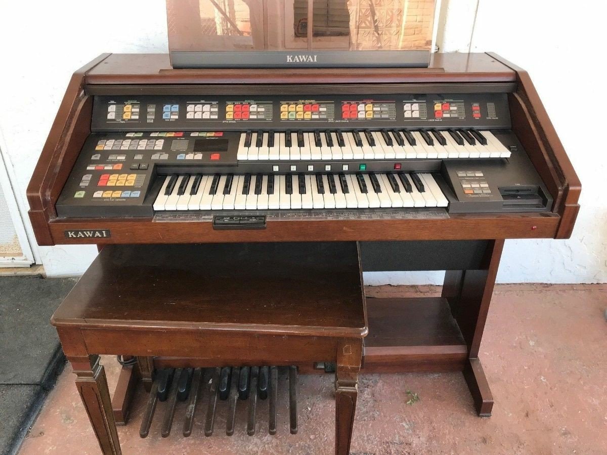 that is a good electric organ. it has like 4 different types of buttons on it and possibly a floppy drive