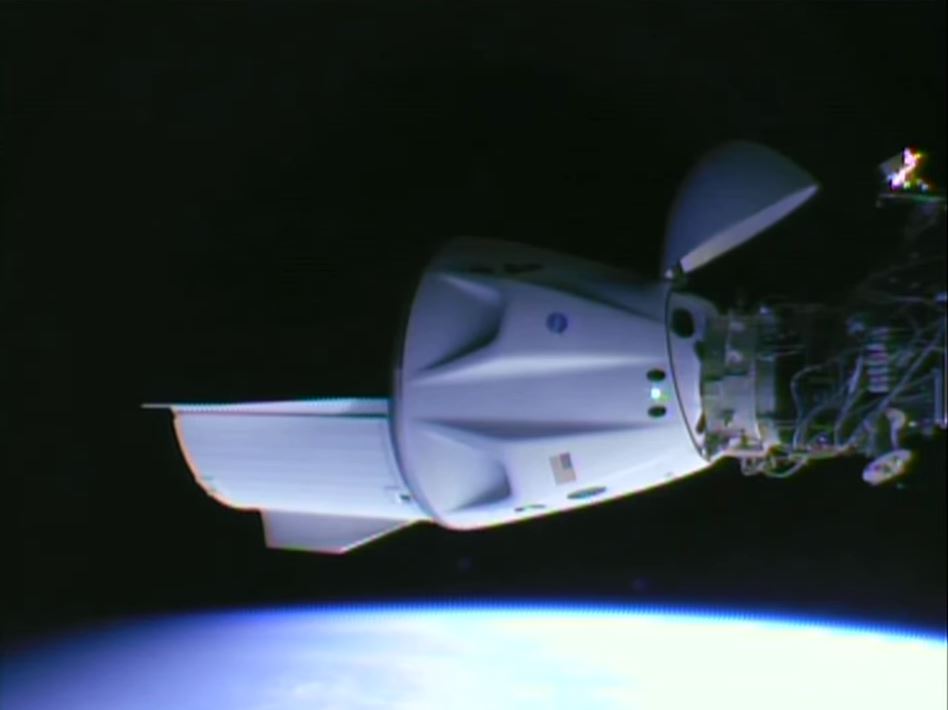 Docking confirmed – second time at the @space_station for this Dragon