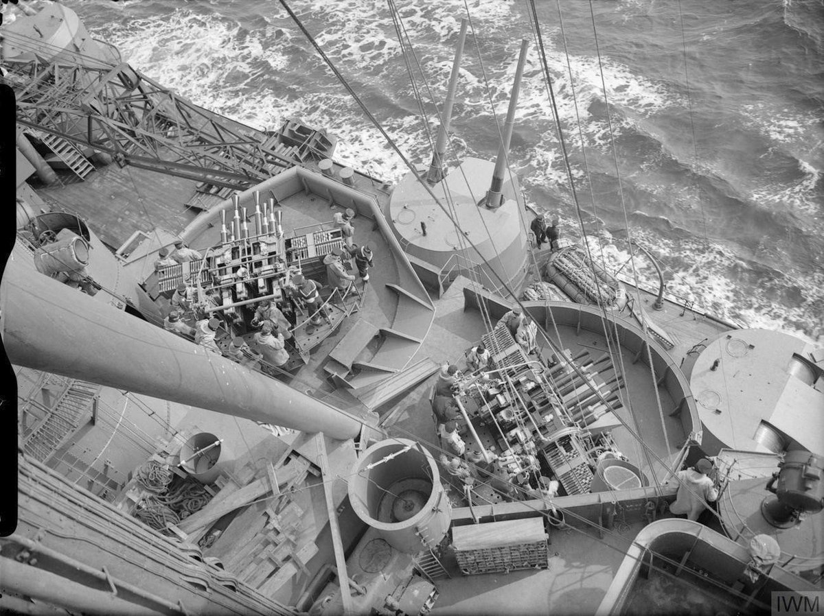 As designed the King George V class had the following anti-aircraft weapons:- 4 x Octuple Pom Poms. Two of these were fitted on each beam, atop the hangar. - 4 x Quad 0.5in machine guns. Two were mounted on the boat deck, one on 'B' turret, and one on 'Y' turret.(3/24)