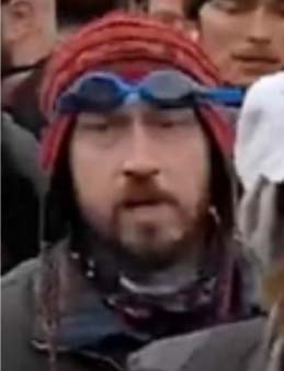 FBI's tweet image. The #FBI has arrested many of the participants in the violence at the U.S. Capitol on January 6. Help us find others who remain at large. Do you recognize this person? Submit a tip at tips.fbi.gov. Remember to reference photo 328.