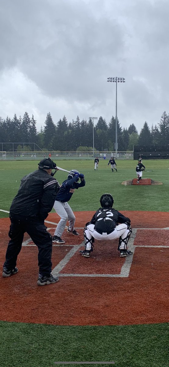 PEBL_Baseball's tweet photo. Gotta love seeing these kids play through the rain! Big ups to @MoundTime @NWFutures @nwdiamond Greenberry A’s for fighting through the weather to play the game we love! #pebl #baseball #PNW #HarmonySportsComplex https://t.co/l1tpzTNSaL