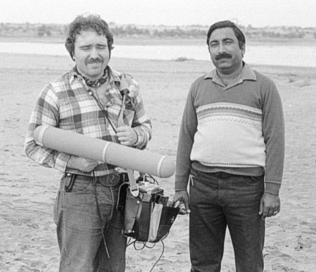 Posting some newly unearthed black & whites from this trip, these from a day when sound recordist Tom Naunas was ill. So that's me with shotgun microphone & Nagra, next to NWFP Chief Forest Officer Mumtaz Malik. Find me in flannel kneeling in the group shot.  #Pakistan