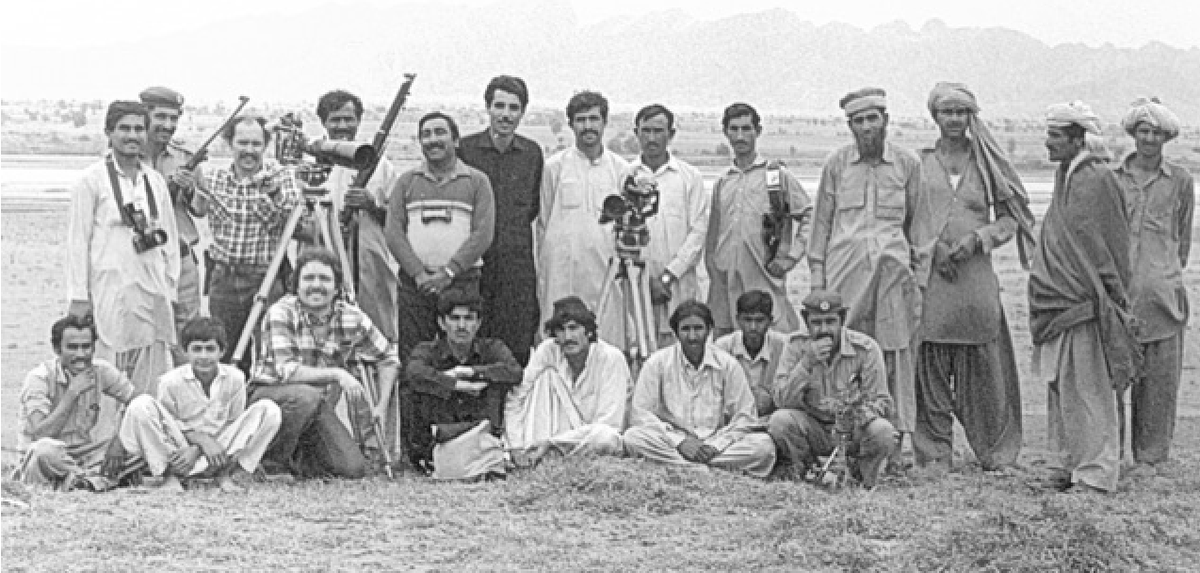 Posting some newly unearthed black & whites from this trip, these from a day when sound recordist Tom Naunas was ill. So that's me with shotgun microphone & Nagra, next to NWFP Chief Forest Officer Mumtaz Malik. Find me in flannel kneeling in the group shot.  #Pakistan