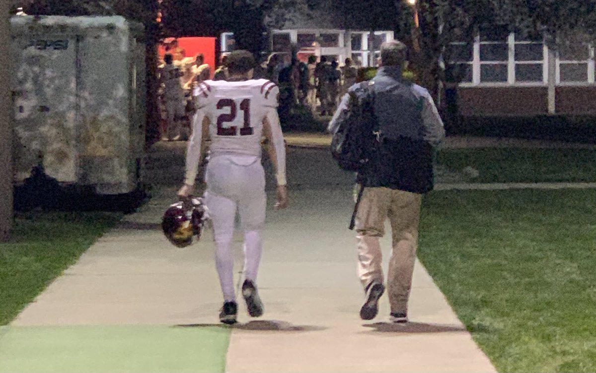 LAFootballAC's tweet photo. Arguably the greatest player and the greatest coach in Loyola Academy football history walk off the field together following yesterday’s win.
#RambleAsOne https://t.co/hKuE6AWctd
