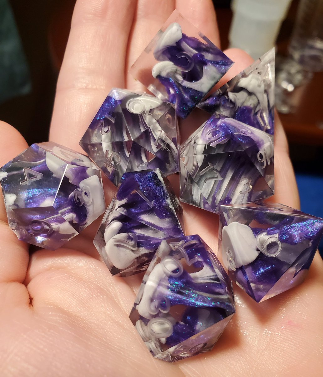 Thank you so much to those who helped me decide on colors for the "phantom" inspired dice!! I poured some sets and wanted to make sure to share! (First two pics are the same set, just had to show off the glow 😉)