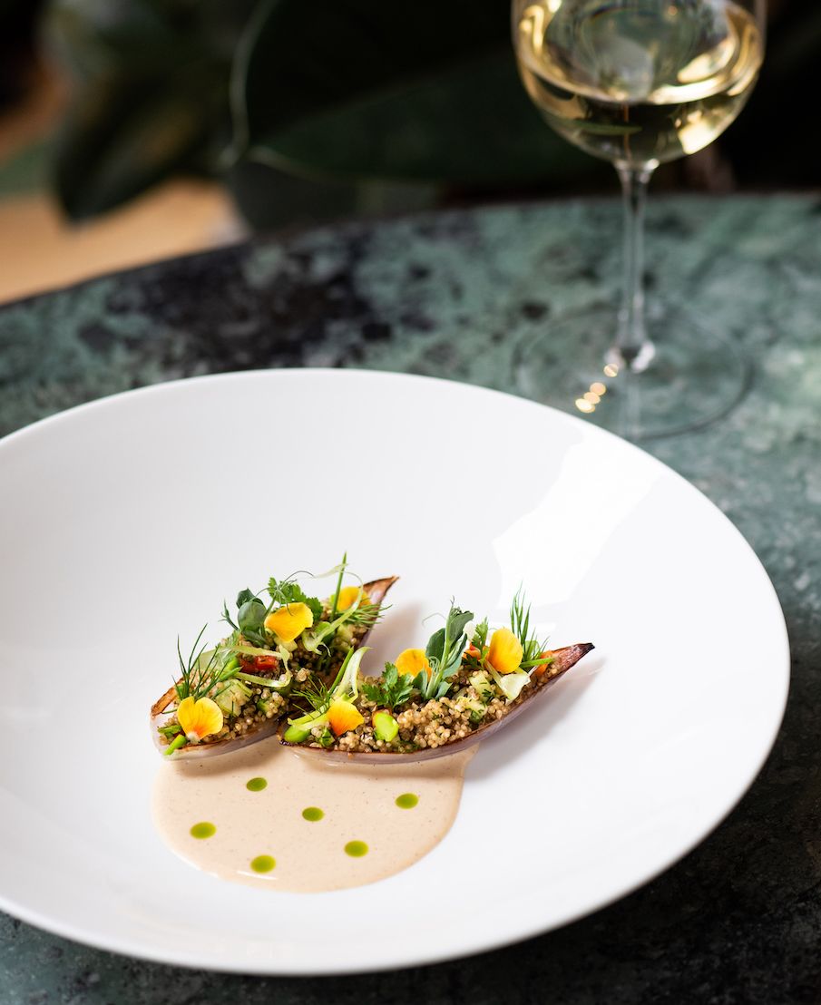 Shallots with a spring vegetable and quinoa salad, almond sauce and chives, on the reopening menu of The Petersham Covent Garden next month. We will reopen on May 17th, and booking is now available. We can't wait to see you!