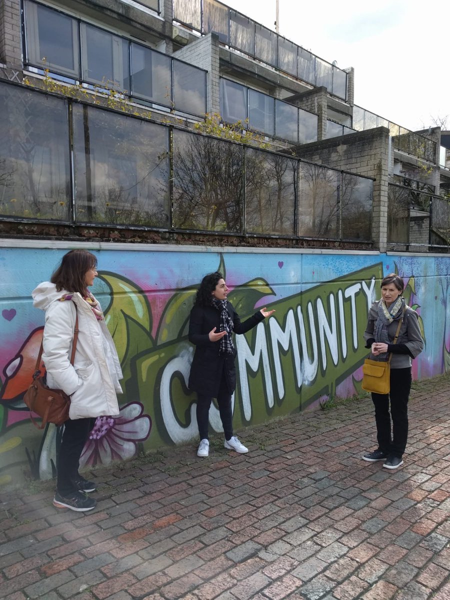 Caroline and Florence talking to Enrica outside the mural.
