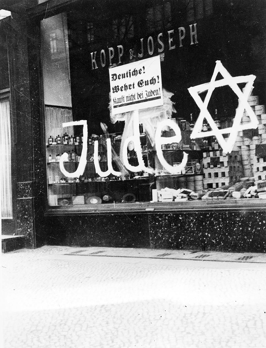 Jewish businesses were highly discriminated against and it was increasingly looked down on if somebody was to enter one of these shops.Nazi guards would stand outside the shops and tell people to not come in because it is ran by Jews.