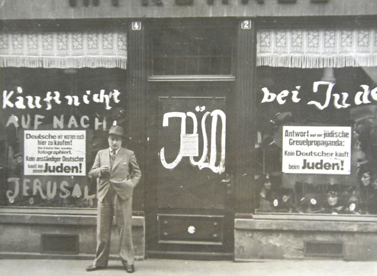 Jewish businesses were highly discriminated against and it was increasingly looked down on if somebody was to enter one of these shops.Nazi guards would stand outside the shops and tell people to not come in because it is ran by Jews.