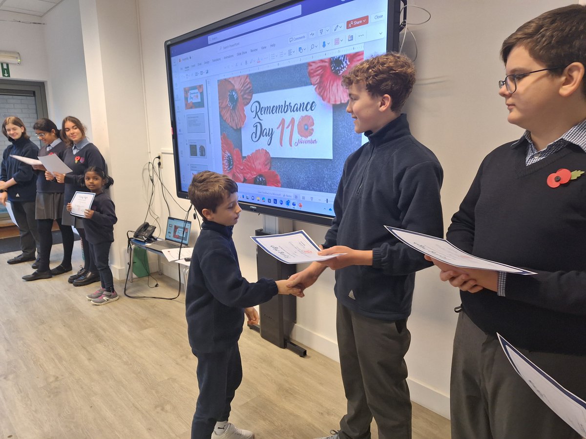 BJAB_History's tweet photo. @BJAB prep students educated students about Remembrance Day and enjoyed awarding Stars of the Week. https://t.co/JzUXc5DwUR