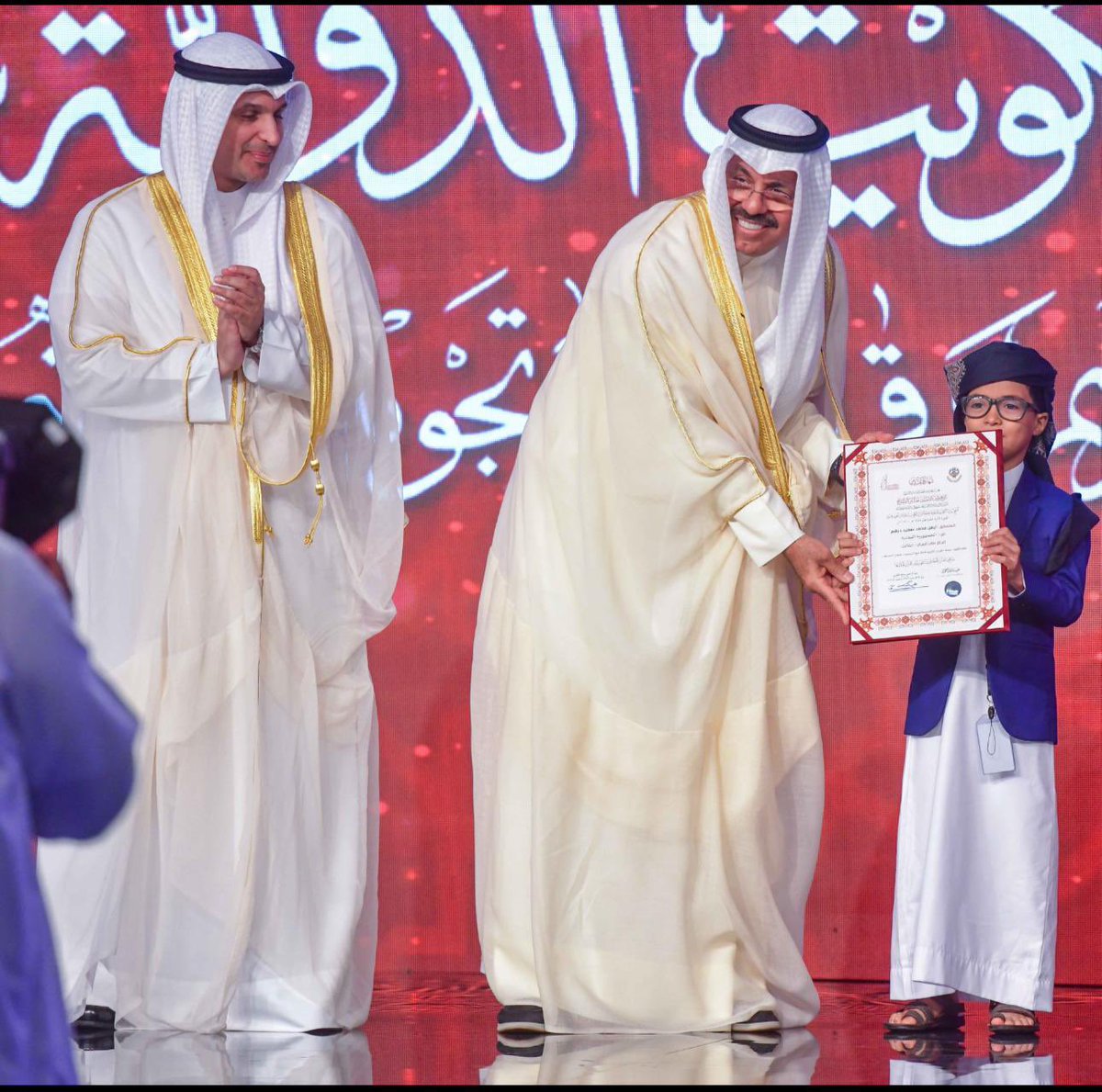 AbAlghanaim's tweet photo. تشرفنا صباح اليوم بالرعاية السامية لحضرة صاحب السمو أمير البلاد الشيخ نواف الأحمد الجابر الصباح حفظه الله ورعاه لحفل ختام جائزة الكويت الدولية لحفظ القرآن الكريم وقراءاته وتجويد تلاوته في دورتها الثانية عشرة بحضور سمو رئيس مجلس الوزراء الشيخ أحمد نواف الأحمد الصباح حفظه الله. https://t.co/0c9btUCAgH