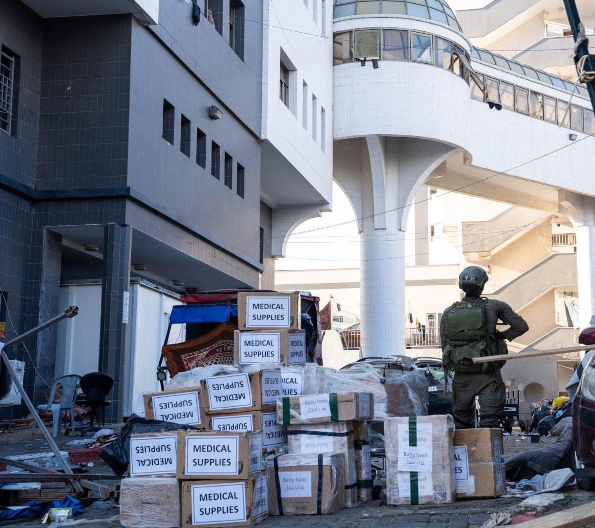 RamAbdu's tweet photo. You bomb them, shoot them, shell them, besiege them for weeks and block fuel and medical supplies, &amp; then you invade the hospital and bring some medical supplies with big signs “medical supply”. What on earth is this logic Israelis have? 
The world doesn’t believe this propaganda https://t.co/WK6phmTGHz