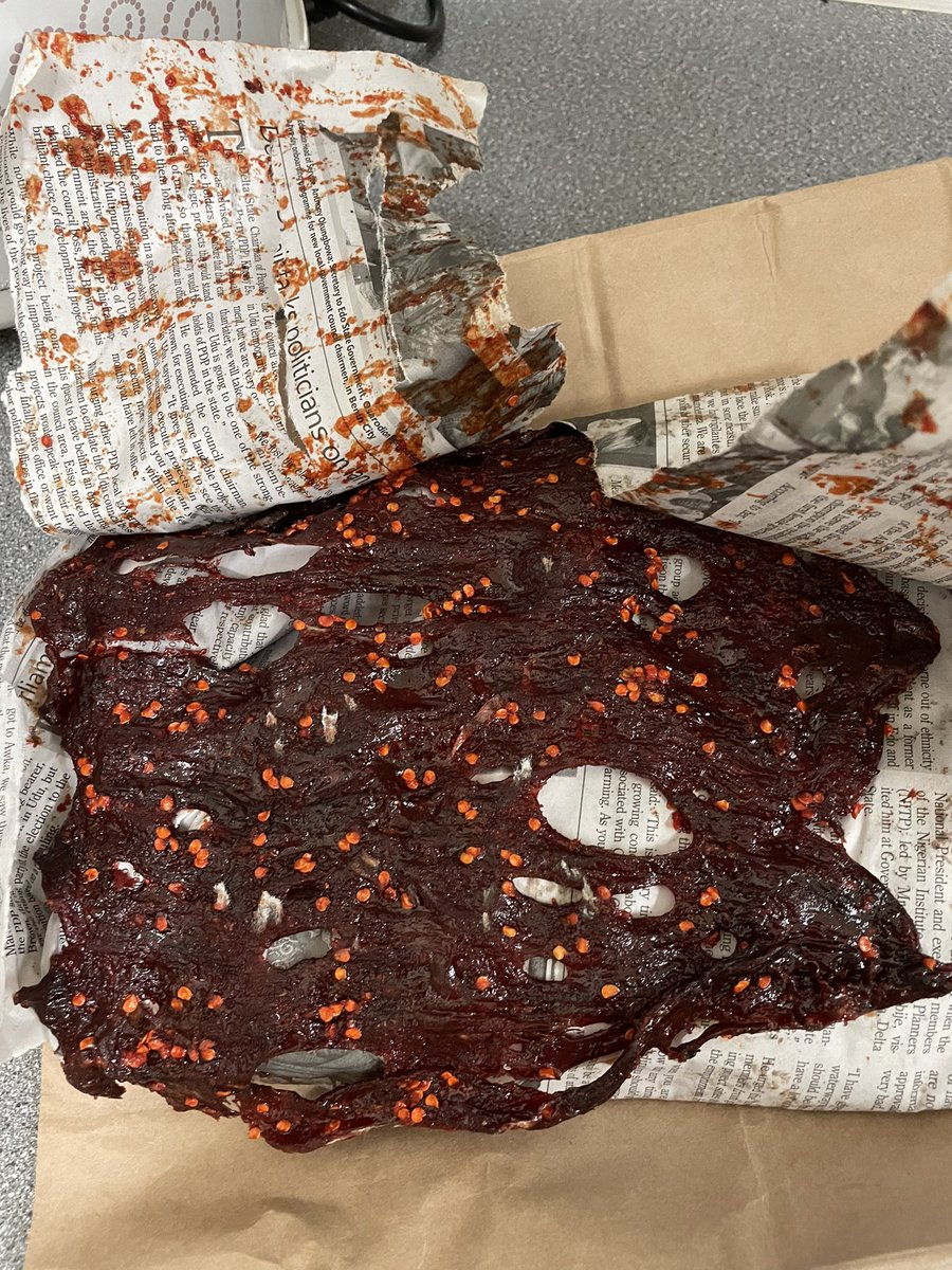 DomWUK's tweet photo. My friends Paul and Rex recently visited Nigeria and asked if they could bring me anything.  So of course I asked for Kilishi - and they delivered!  

The proper stuff - fiery and wrapped in newspaper.  Dis food sweet well well! Thank you Paul, Rex and Naija 🙏🏼 https://t.co/7MUdJEGkfi