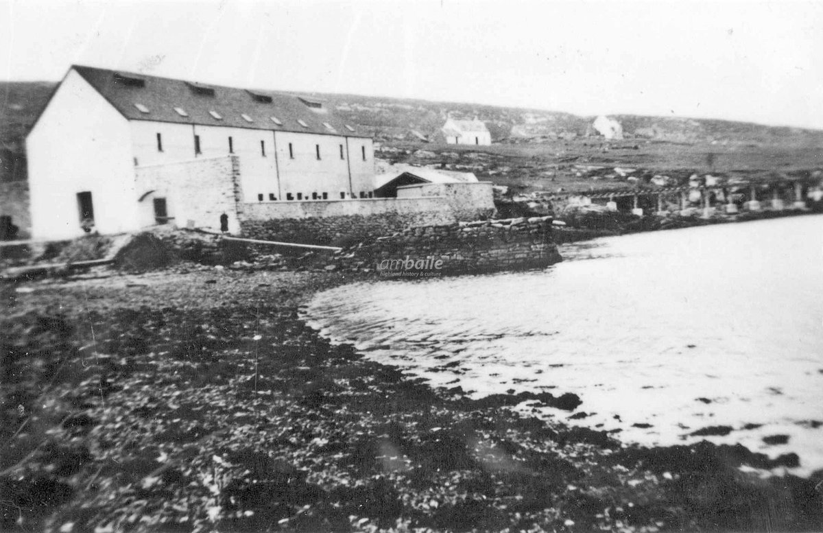 The flour mill on Isle Martin, c1930. The mill operated in the old herring curing station which had been built in the 1770s. There was a light railway running from the jetty to the mill which was removed after the mill closed down [photo from the collections @UllapoolMuseum]