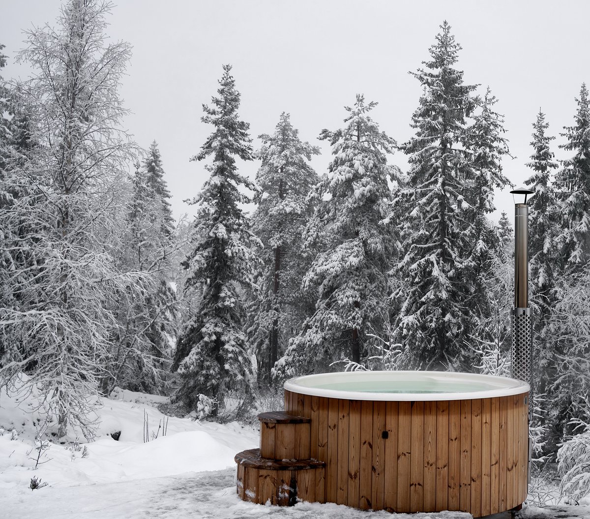 Hot tub in the snow, the perfect way to warm up on a cold day.