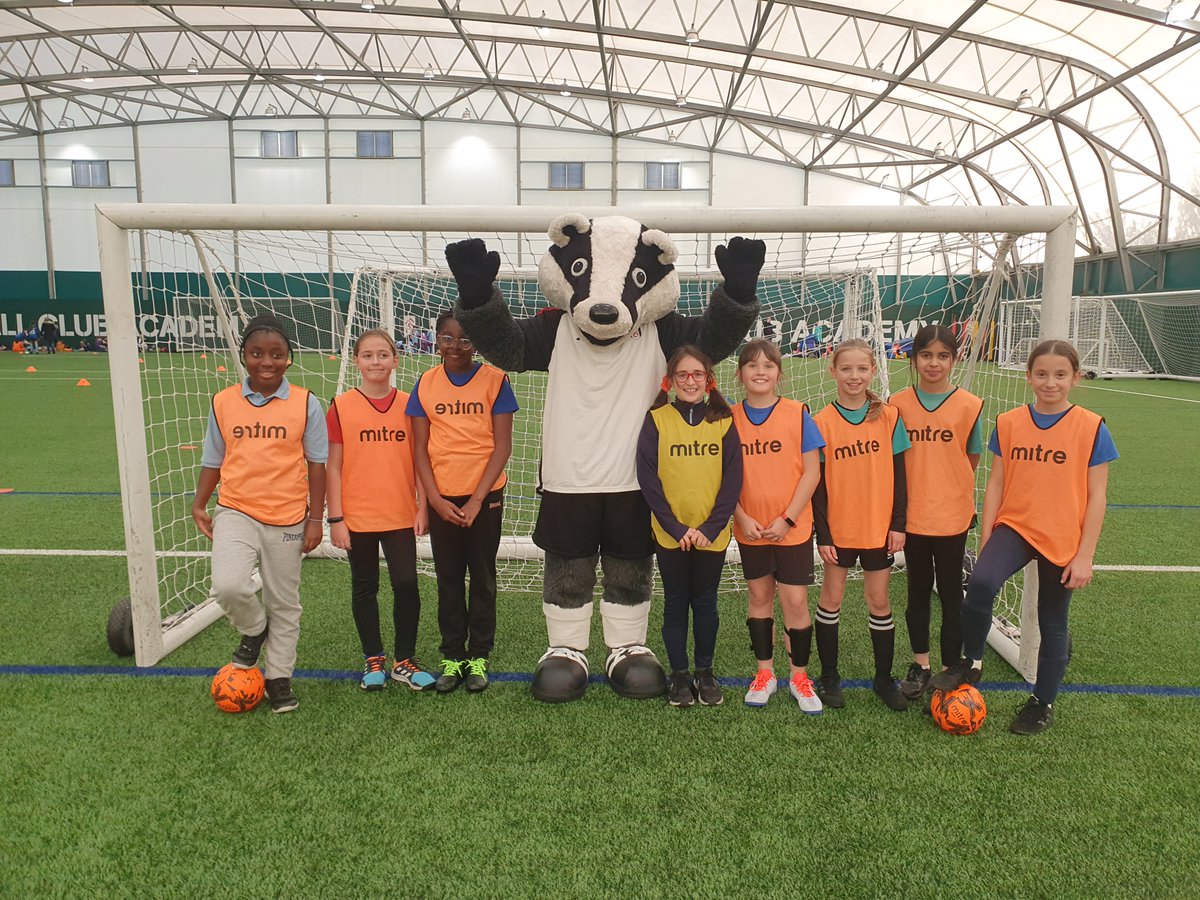 PrimaryWoody's tweet photo. Woody girls' football team competed in the Fulham FC Foundation Cup today at Fulham FC Training Ground. They were excited to arrive, had heaps of fun playing in the all-weather dome and met Fulham Mascot, Billy the Badger. #smilesallround #fulhamfc #fulhamfcfound https://t.co/PEnBFJnBMC