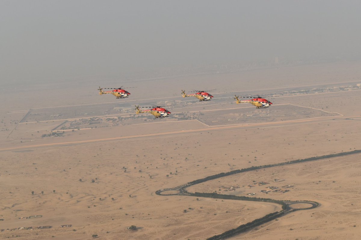 htTweets's tweet photo. #InPics | An #IAFTejas and the Sarang Helicopter Display Team were on show at the inauguration of the #DubaiAirshow today.
(📸ANI) https://t.co/hJ2z2tfHbY