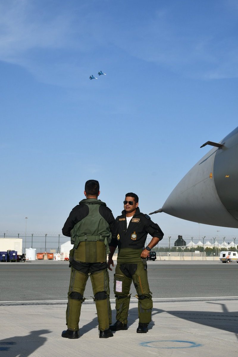 htTweets's tweet photo. #InPics | An #IAFTejas and the Sarang Helicopter Display Team were on show at the inauguration of the #DubaiAirshow today.
(📸ANI) https://t.co/hJ2z2tfHbY