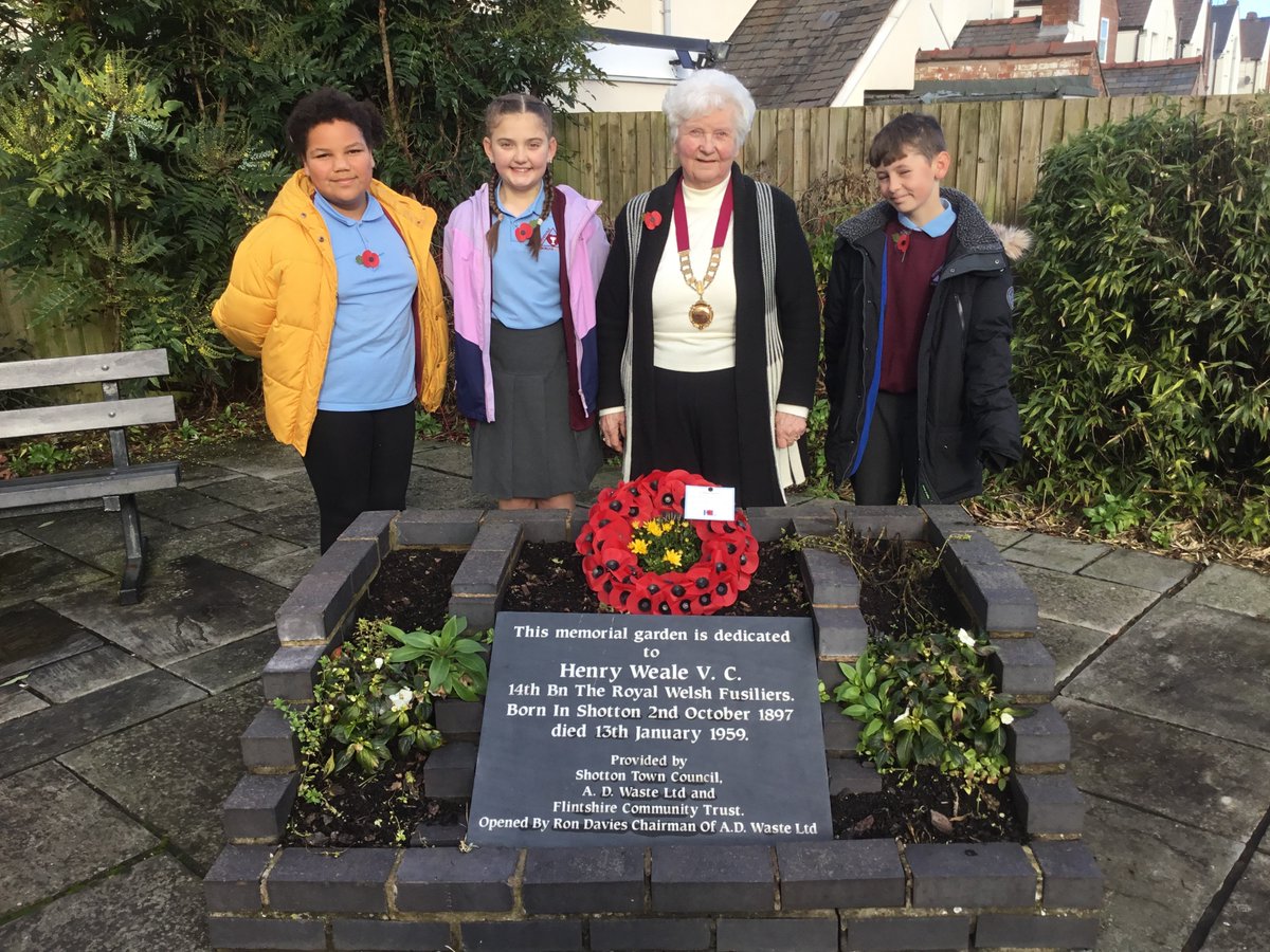 A wreath was laid on Friday at the Harry Weale V.C. memorial garden in Shotton by Councillor Doreen Mackie, Vice Chair of Shotton Town Council.
School Ambassadors from Venerable Edward Morgan School assisted and paid their respects.
#lestweneverforget