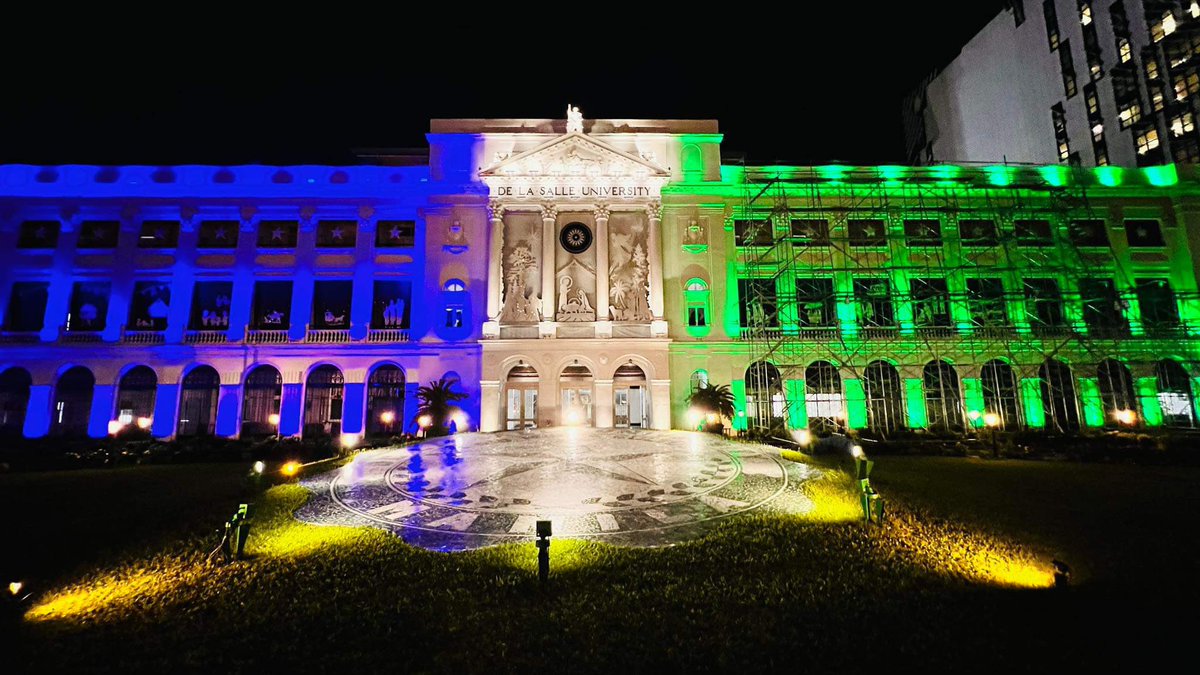 DLSU lights the St. La Salle Hall to blue and green following the court’s decision to allow former Senator Leila de Lima to post bail for the last drug case against her. Blue is the trademark color of De Lima while green is the color of her alma mater.