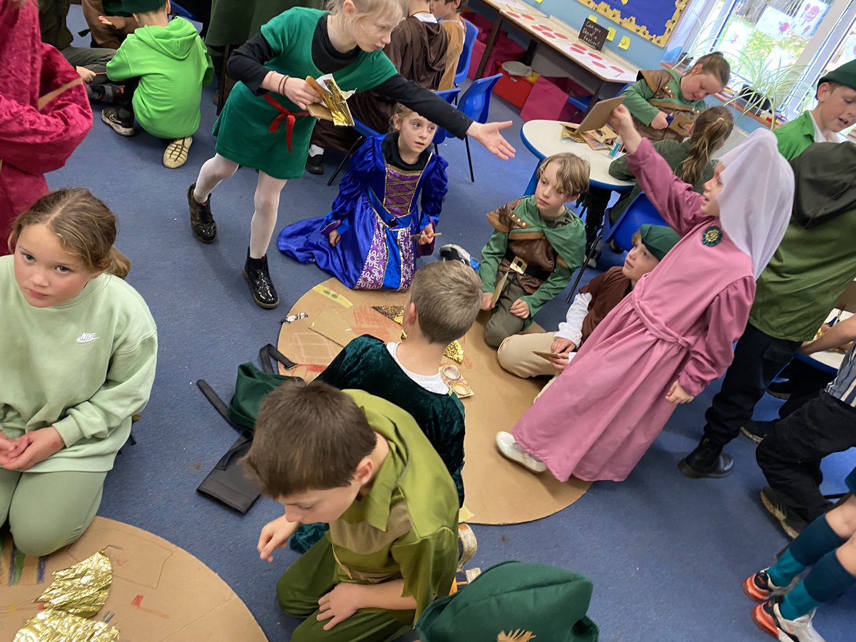 MissWildmanStM's tweet photo. Having a lovely time, tea bing our year 5 buddies how to make gold coins before the panto @StMSchStewkley #robinhoodday #artatstmichaels @Y5StMSch https://t.co/4BAlWXEQNW