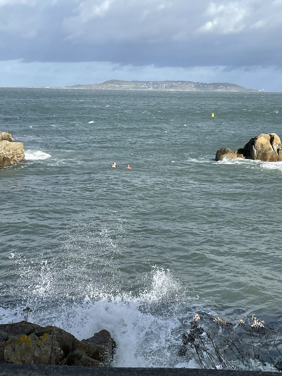 buckley_st's tweet photo. Swimmers at the Forty Foot despite #StormDebi https://t.co/qcQE8hvf8k