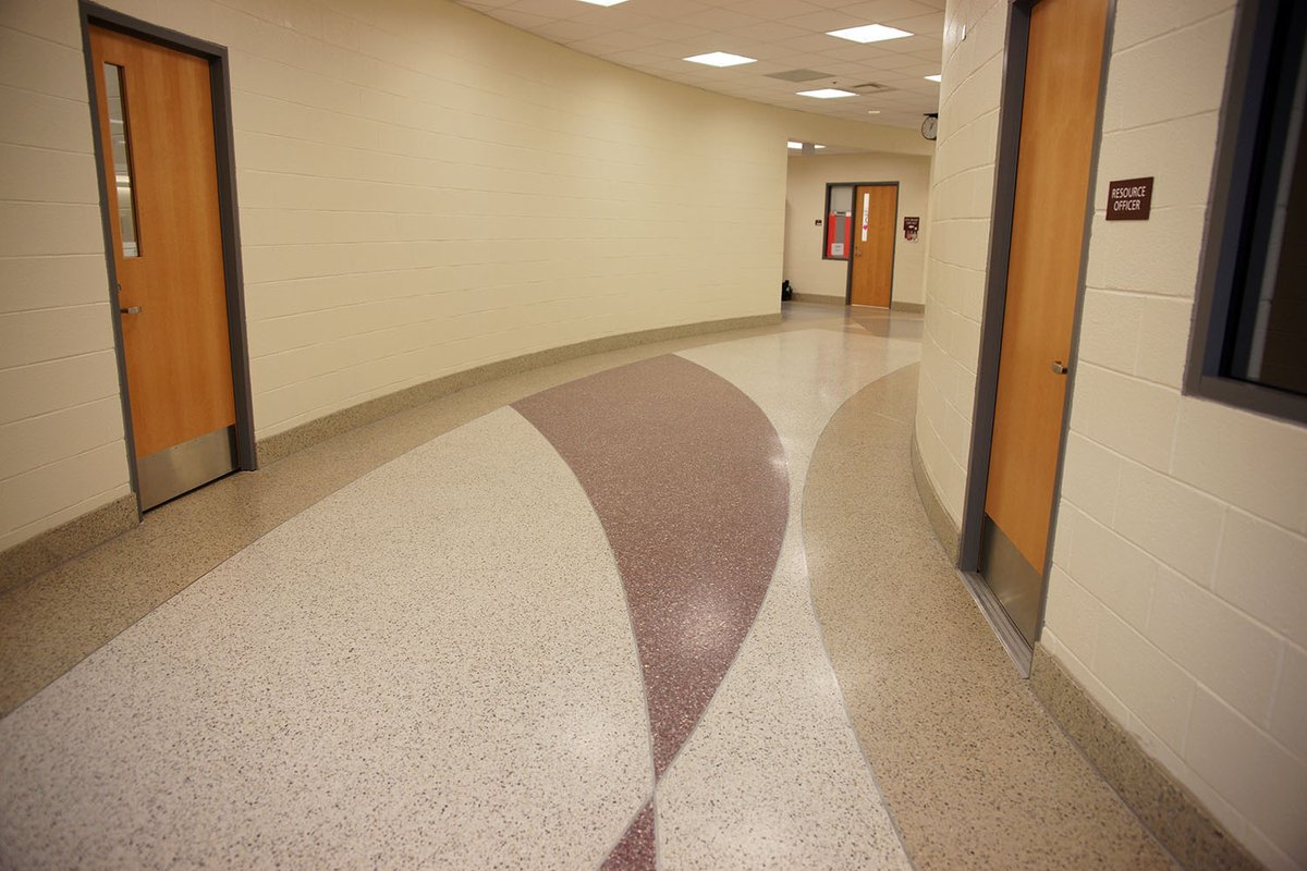 Terrazzo is selected for educational institutions due to its enduring strength and durability. It proves advantageous in spaces like lobbies and hallways for its easy maintenance and cleaning properties. #terrazzo #schooldesign #flooring