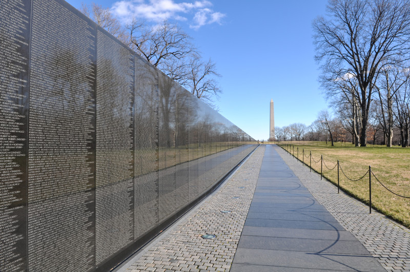 DrPnygard's tweet photo. Today in 1982, thousands of #VietnamWar veterans first contemplated a wall of black granite sunk into the ground & etched with the names of >58,000 of their comrades killed in the conflict. #MayaLin's stark design proved controversial, but the impact of #TheWall remains powerful. https://t.co/uveC7k1dpI