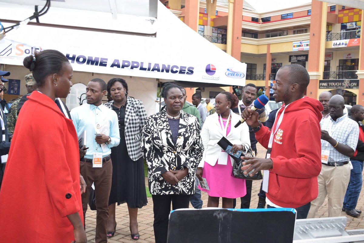 Minister of Energy & Mineral Development, on a guided tour through the stalls at the Energy & Minerals Exhibition 2023. Join us at Akamwesi Shopping Mall from November 13th to 18th Nov. 2023! #EME2023 #CleanEnergy