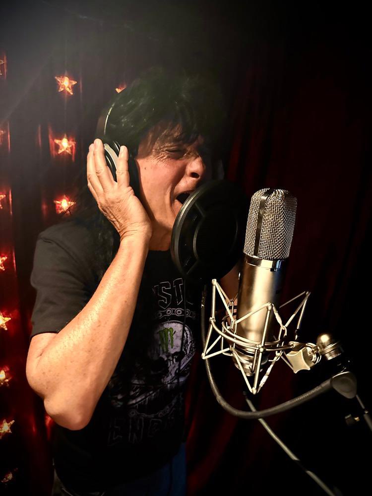 Anthrax's tweet image. Joey Belladonna in the Studio with producer Jay Ruston
"Every take I do has to be full of energy and full of impact, so I’m knocking down every chair in the room to get to the other side, just trying to get something really, really magical.” Joey
Photo Credit: Krista Belladonna
