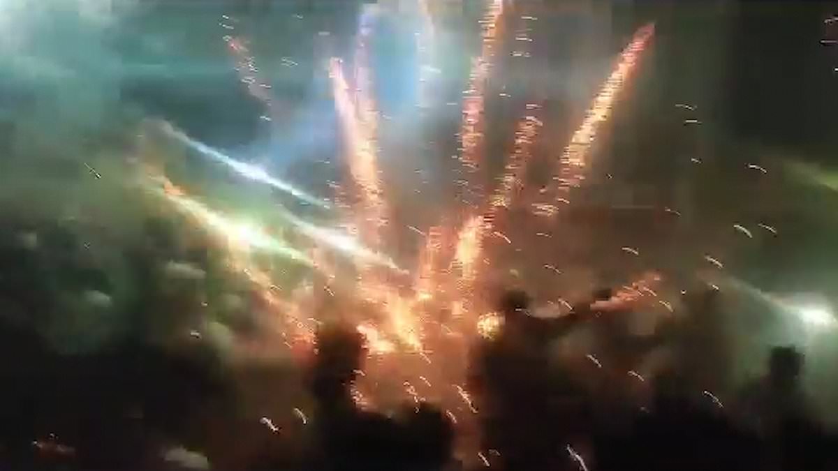DailyMail's tweet photo. India's terrifying new movie trend: Fans set off fireworks inside cinema when Bollywood star Salman Khan appears on screen - sparking panic in theatres https://t.co/htn3HudPzn https://t.co/czVuAiAeV1