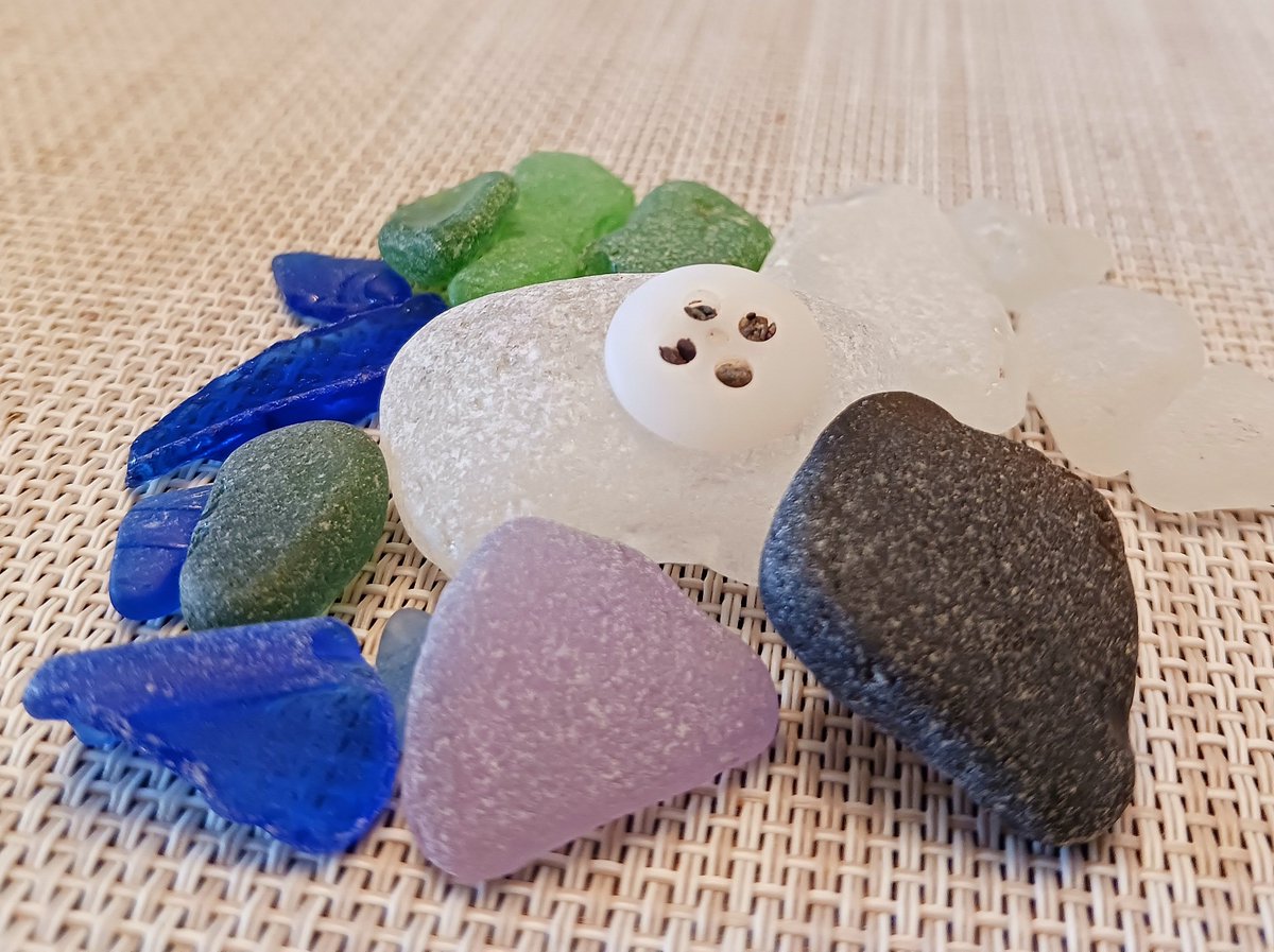 The Sea had some treasures today  - especially the purple and black.  The black piece is old, and it's green when you hold it to the light.

#seaglass #BonavistaPeninsula