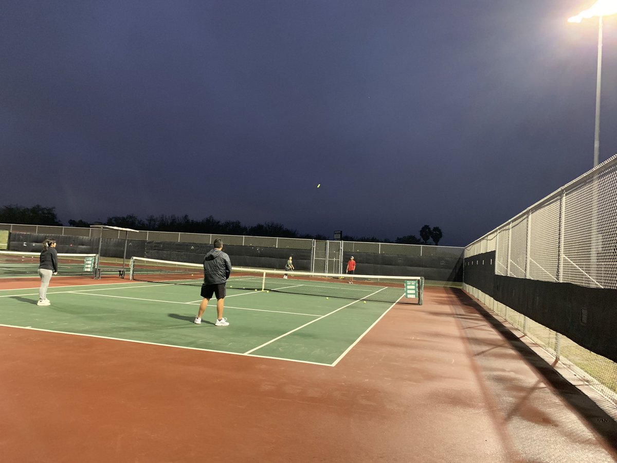 WEast_Tennis's tweet photo. @WeslacoEastHigh varsity players made the extra effort to dry up one court to teach a pair of new players today. My eyes are watering up bc of rogue drizzle drops…frfr ;) proud coach moment achieved @WehsAthletics @WeslacoISD https://t.co/OteNXNaWL6