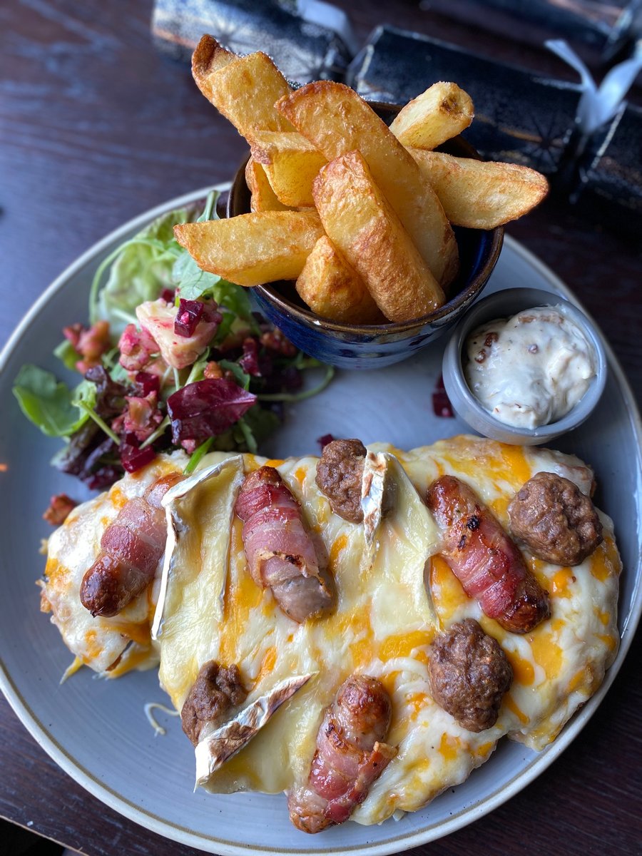 The Festive Parmo 👍👎
What's your thoughts?

Chicken Parmo topped with camembert, honey mustard pigs in blankets &amp; stuffing balls. Served with beef dripping chips, beetroot, stilton &amp; walnut salad with sage &amp; onion mayo.

Our festive menu from December 1st
#parmo #chickenparmo
