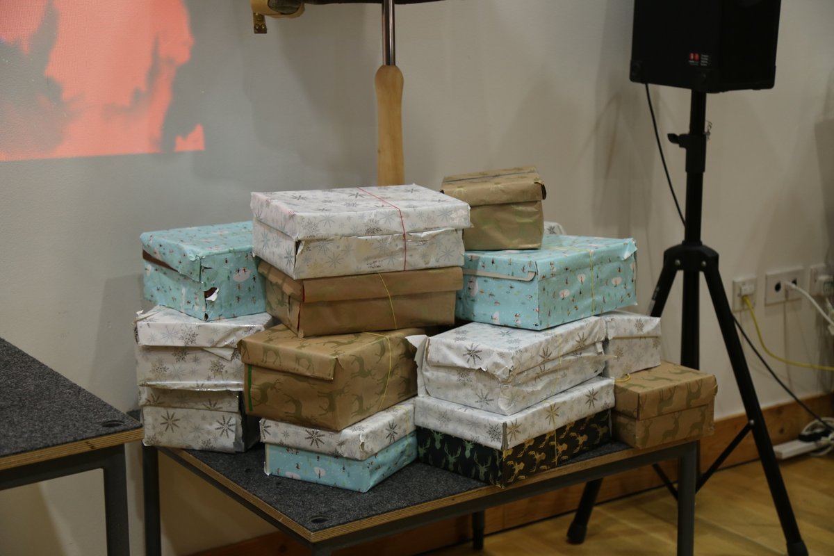 UrswickSchool's tweet image. To coincide with Remembrance, Year 7 and Year 8 have been thinking about being PEACEMAKERS: donating tins to the homeless @Providence_Row, and shoeboxes to @linktohope.  Sixth Former Arzu and Ali volunteered to help with the packing.