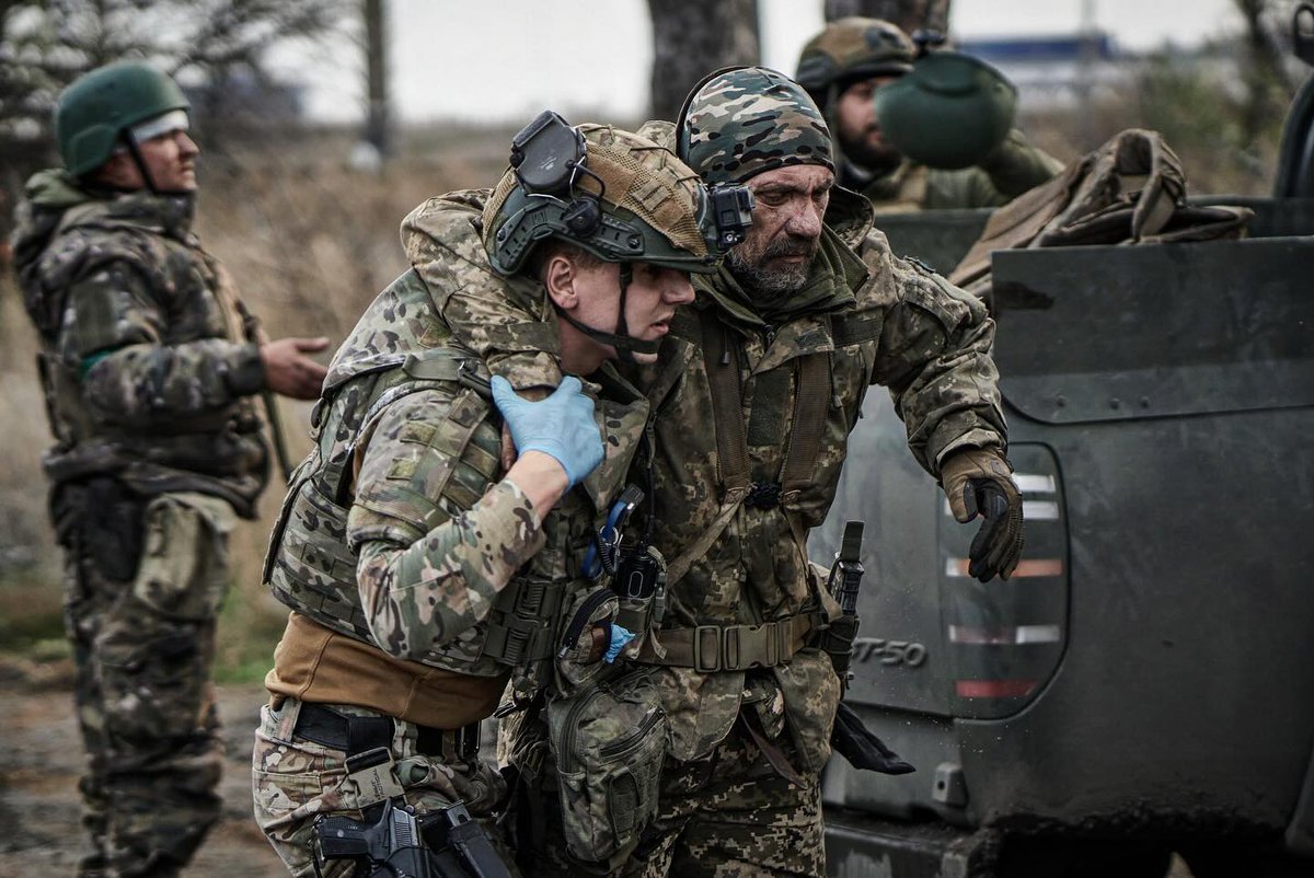 ZelenskyyUa's tweet photo. Our combat medics.

Under fire and in extreme conditions, every day they save the lives of our warriors, treat them, and do everything in their power to save them.

I thank our combat medics for their vital and selfless work and for every life they saved. https://t.co/lCjLfT4MMT