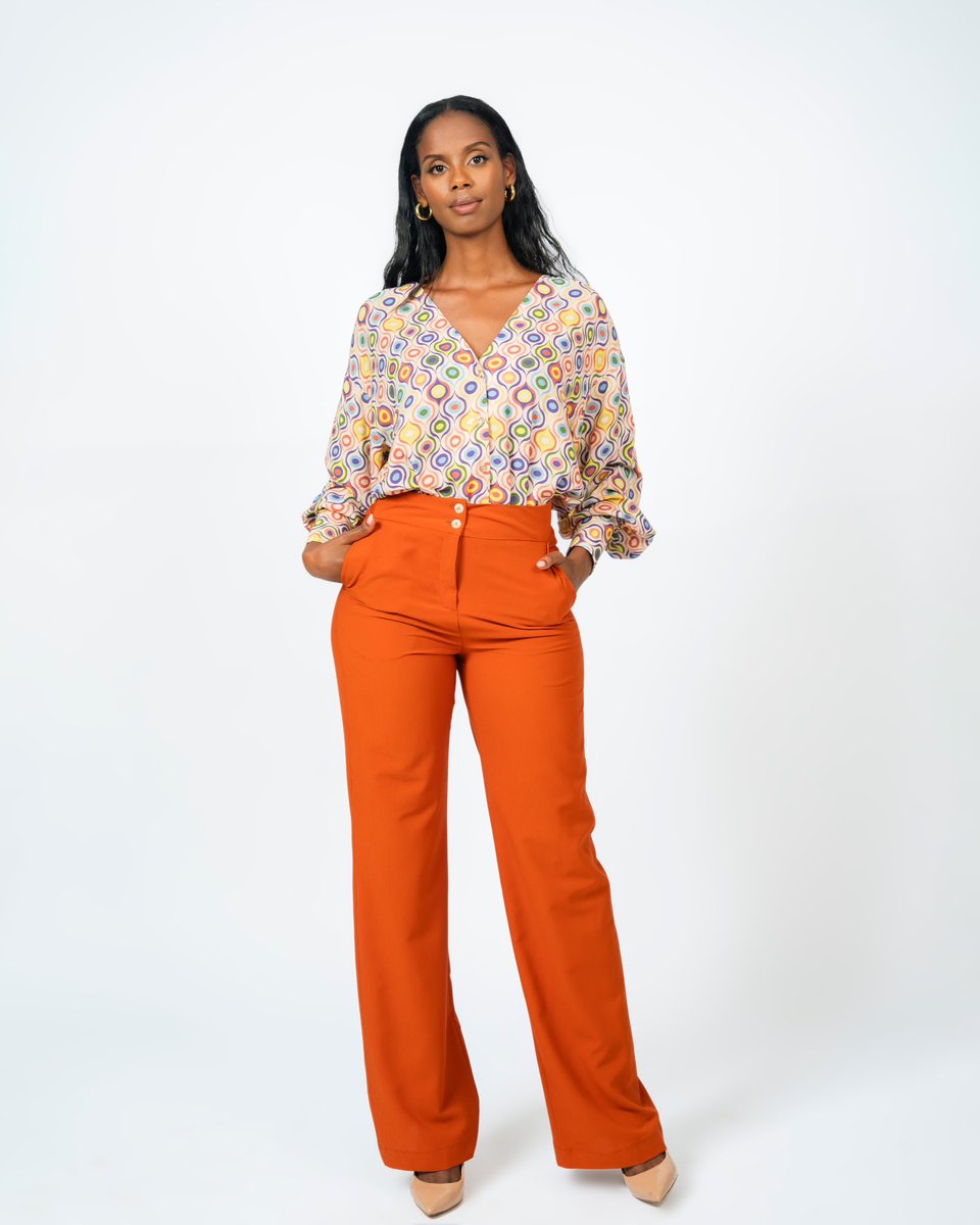 soniamugabo's tweet image. The "Robwa" Set elegantly combines a printed blouse with high-waisted pants in burnt orange, creating a simple yet fashionable ensemble. 

#soniamugabo #fashion #Xcollection #madeinRwanda #africanfashion